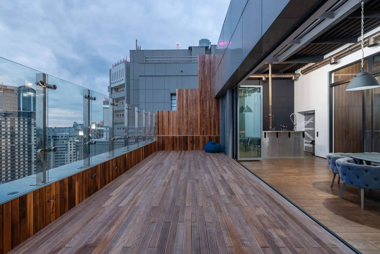 Penthouse terrace with glass railing