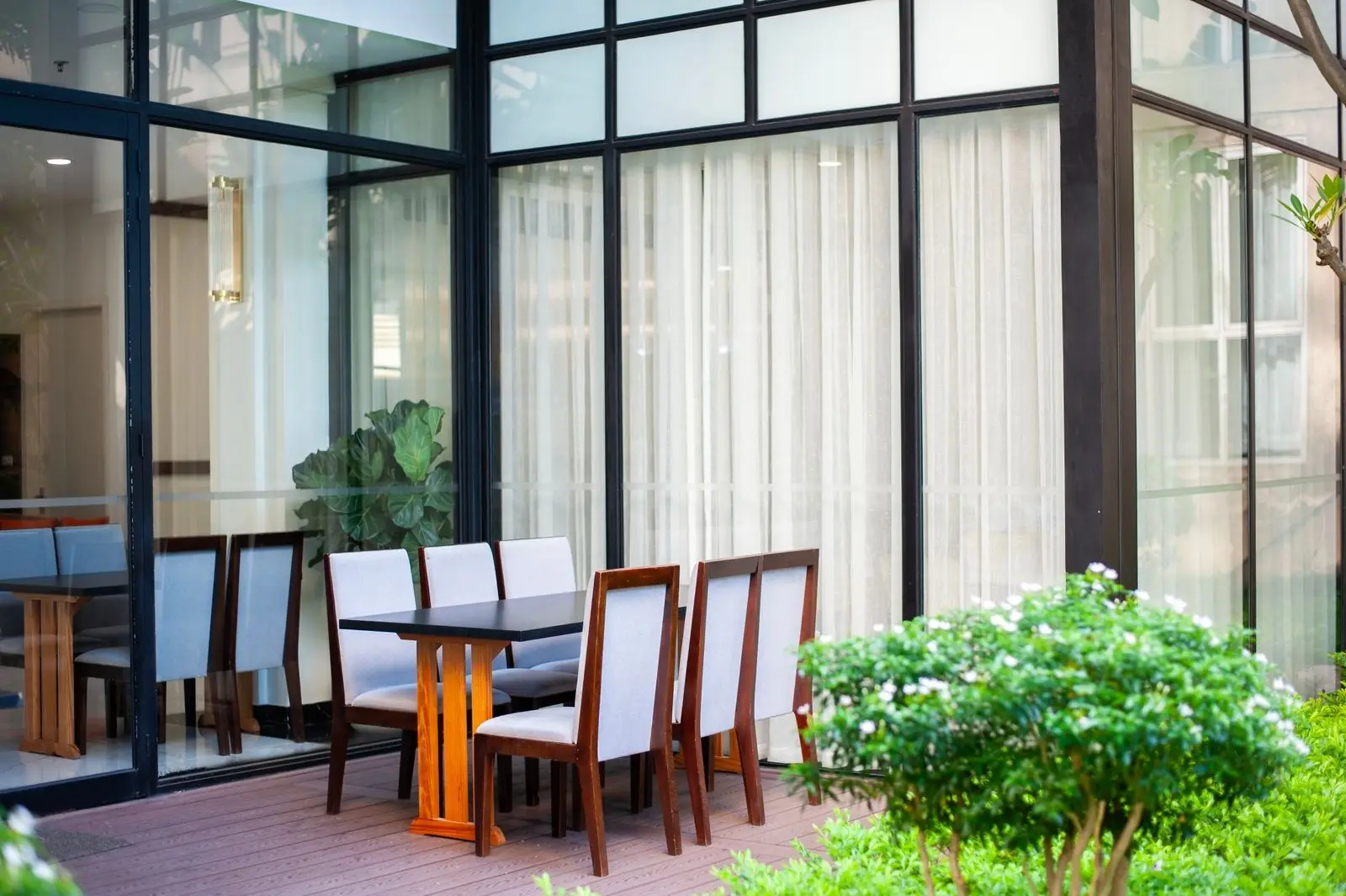 Restaurant terrace with glass walls